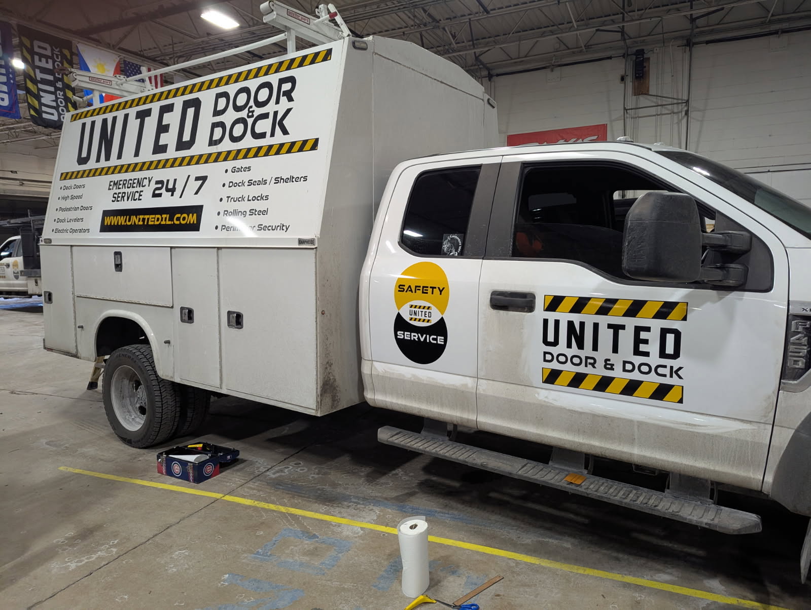 United Door & Dock service truck lettering